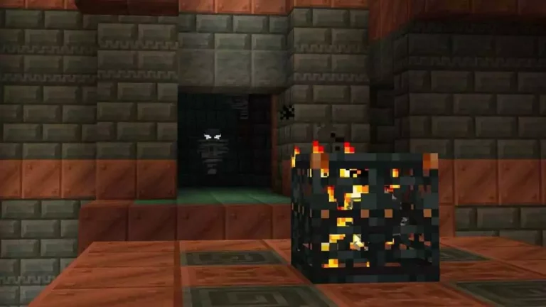 Spawner enflammé dans un couloir sombre de Minecraft.